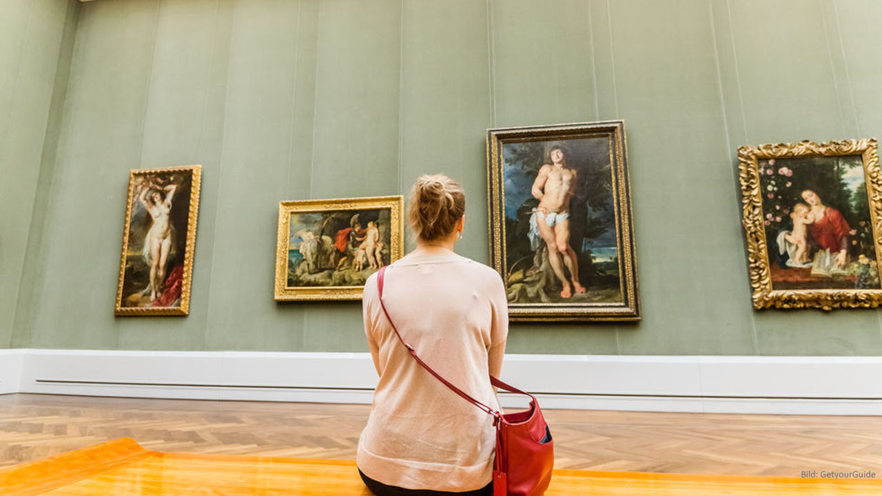 Visitors looking at the paintings In the Gemäldegalerie Berlin